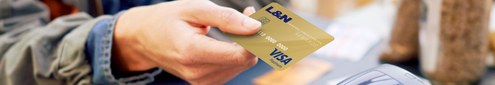 a person paying with an L&N FCU credit/debit card