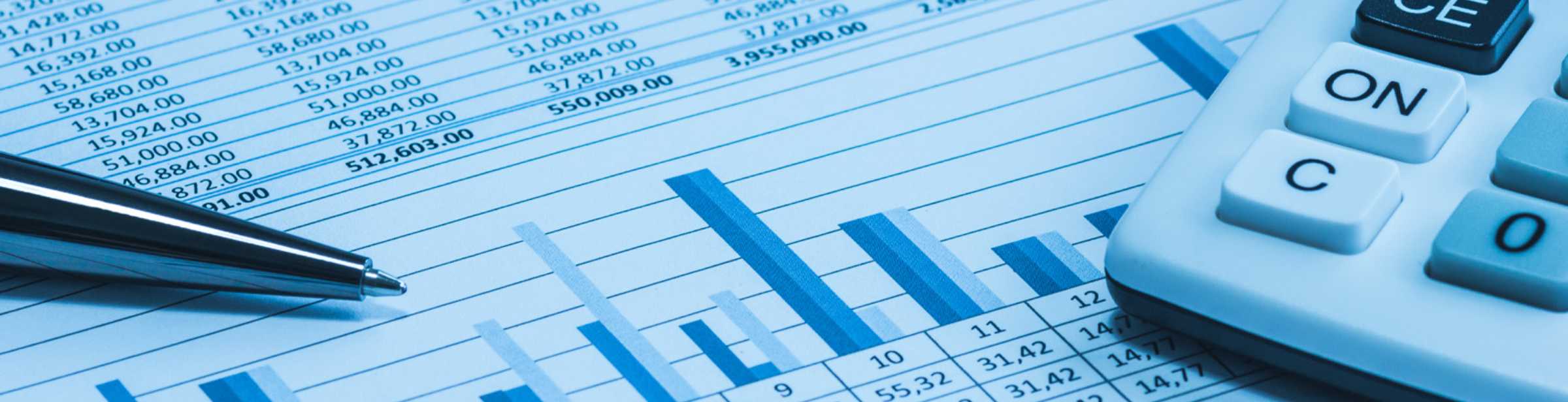 financial documents, writing pen and calculator